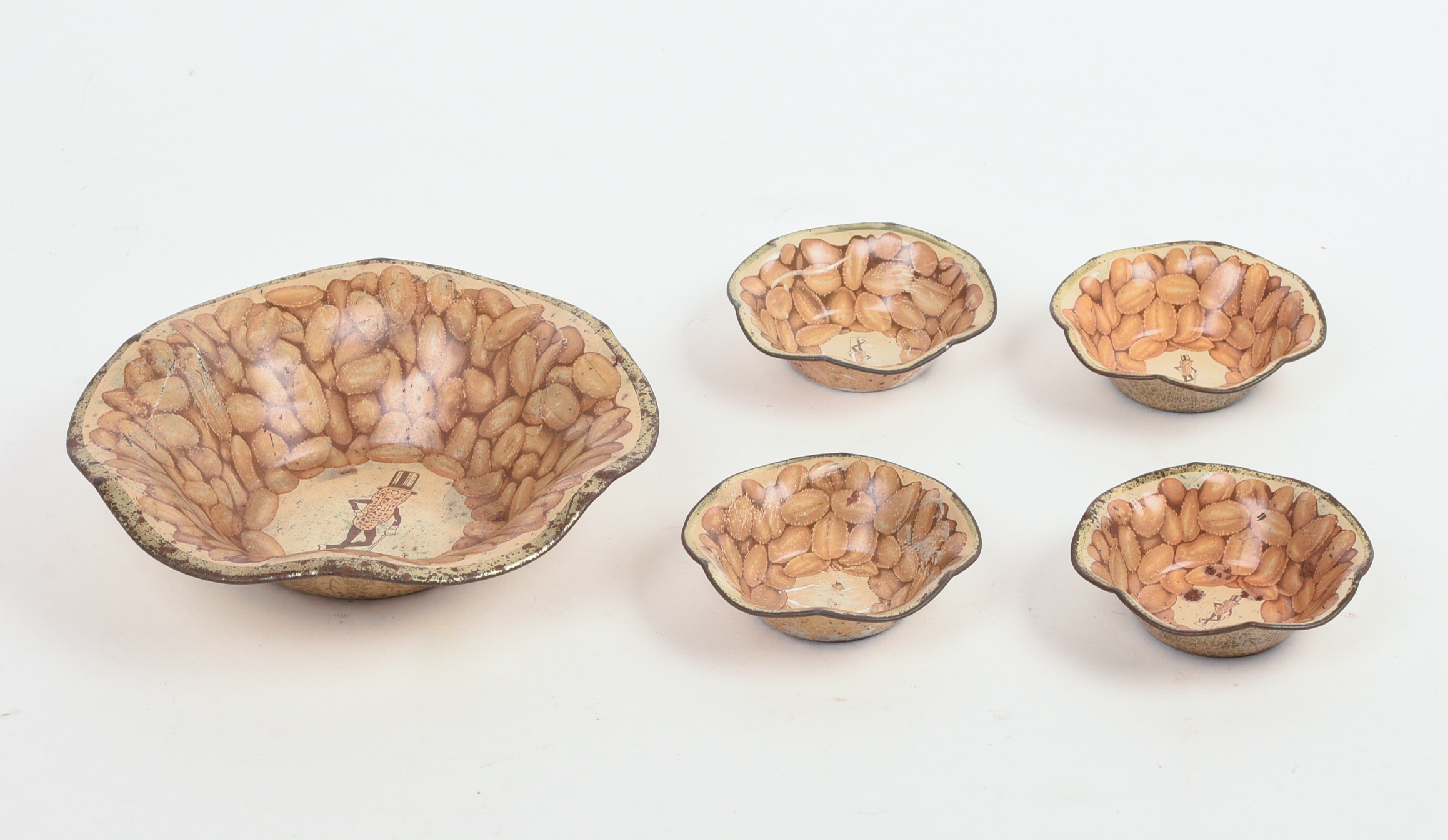 Five Mr. Peanut Tin Bowls.