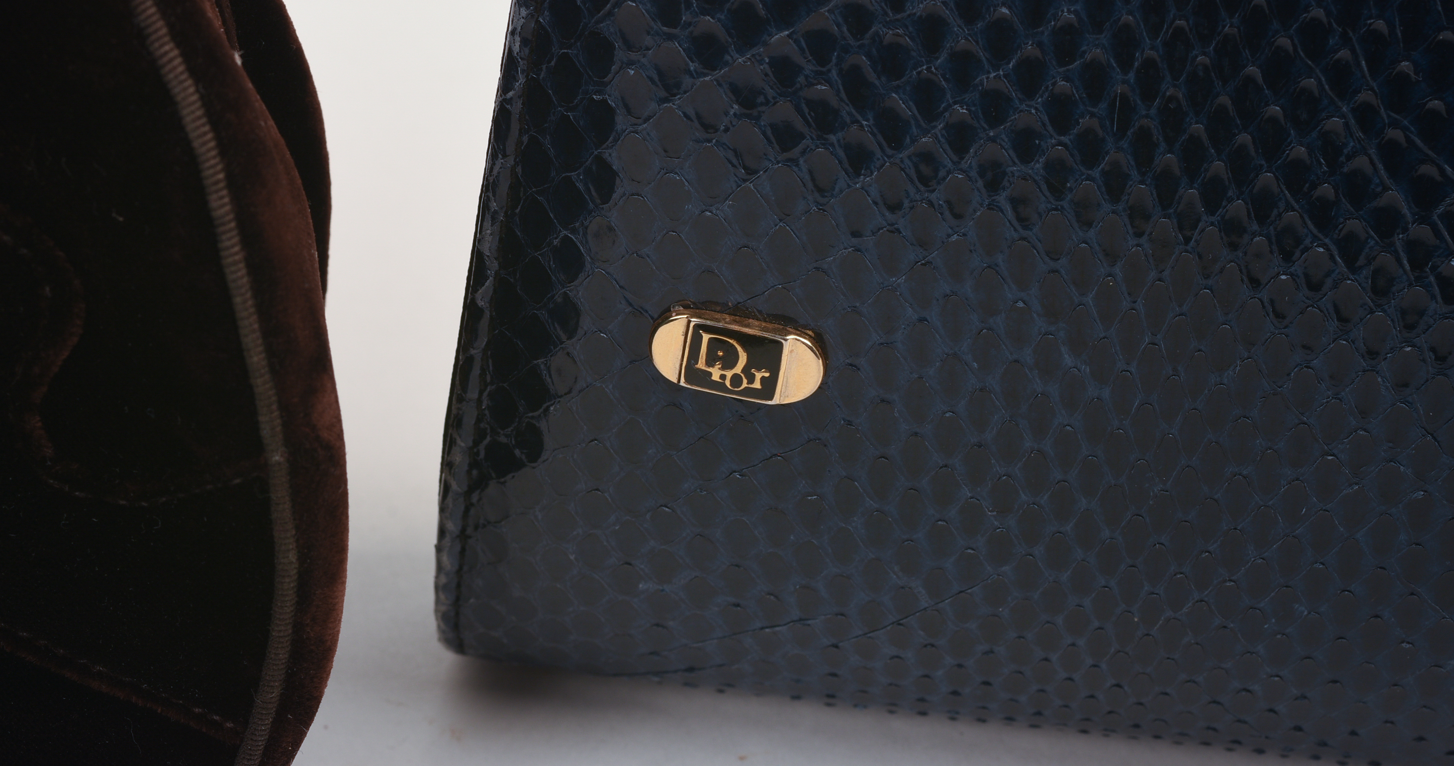 THREE DESIGNER CLUTCHES.