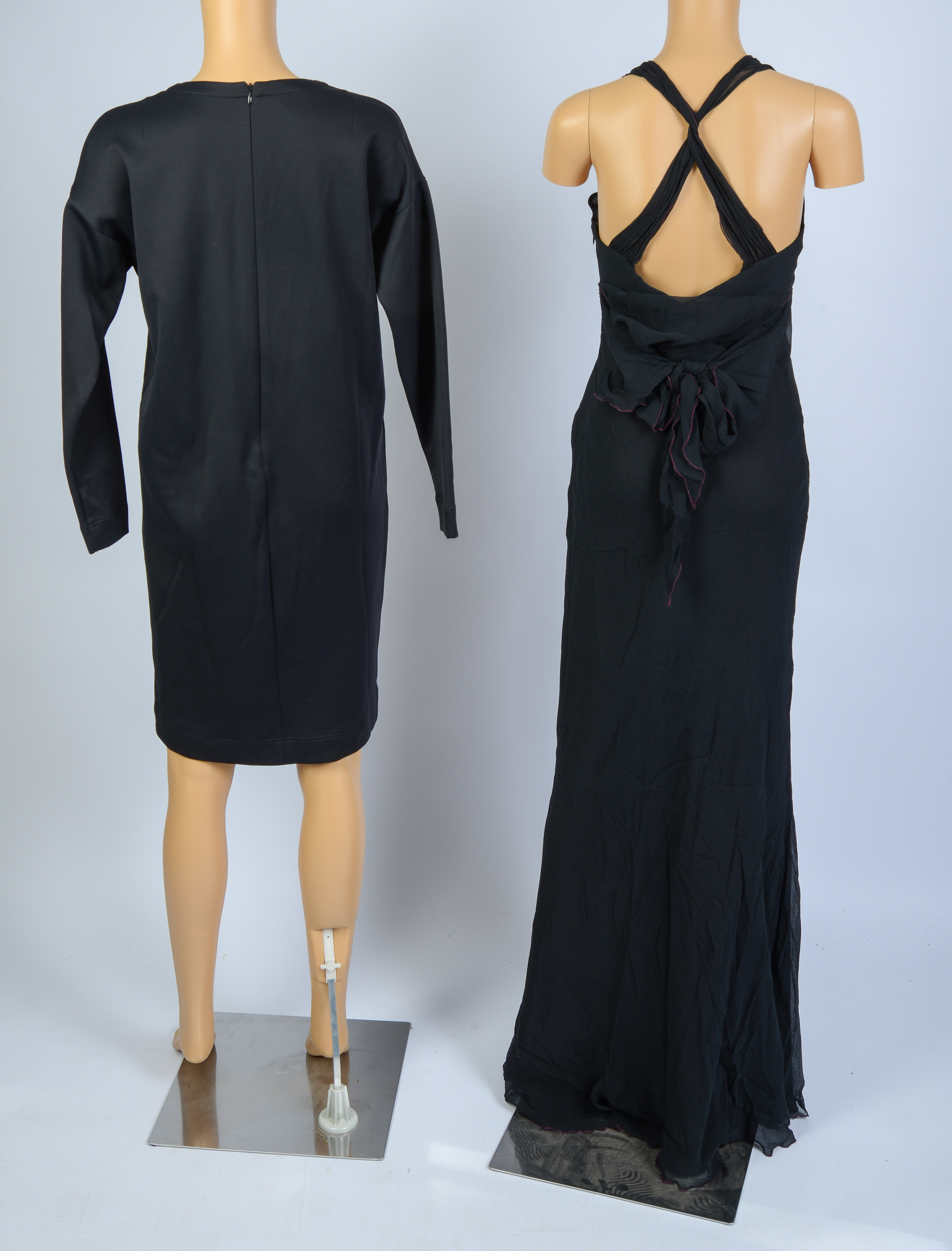 TWO BLACK DESIGNER DRESSES.