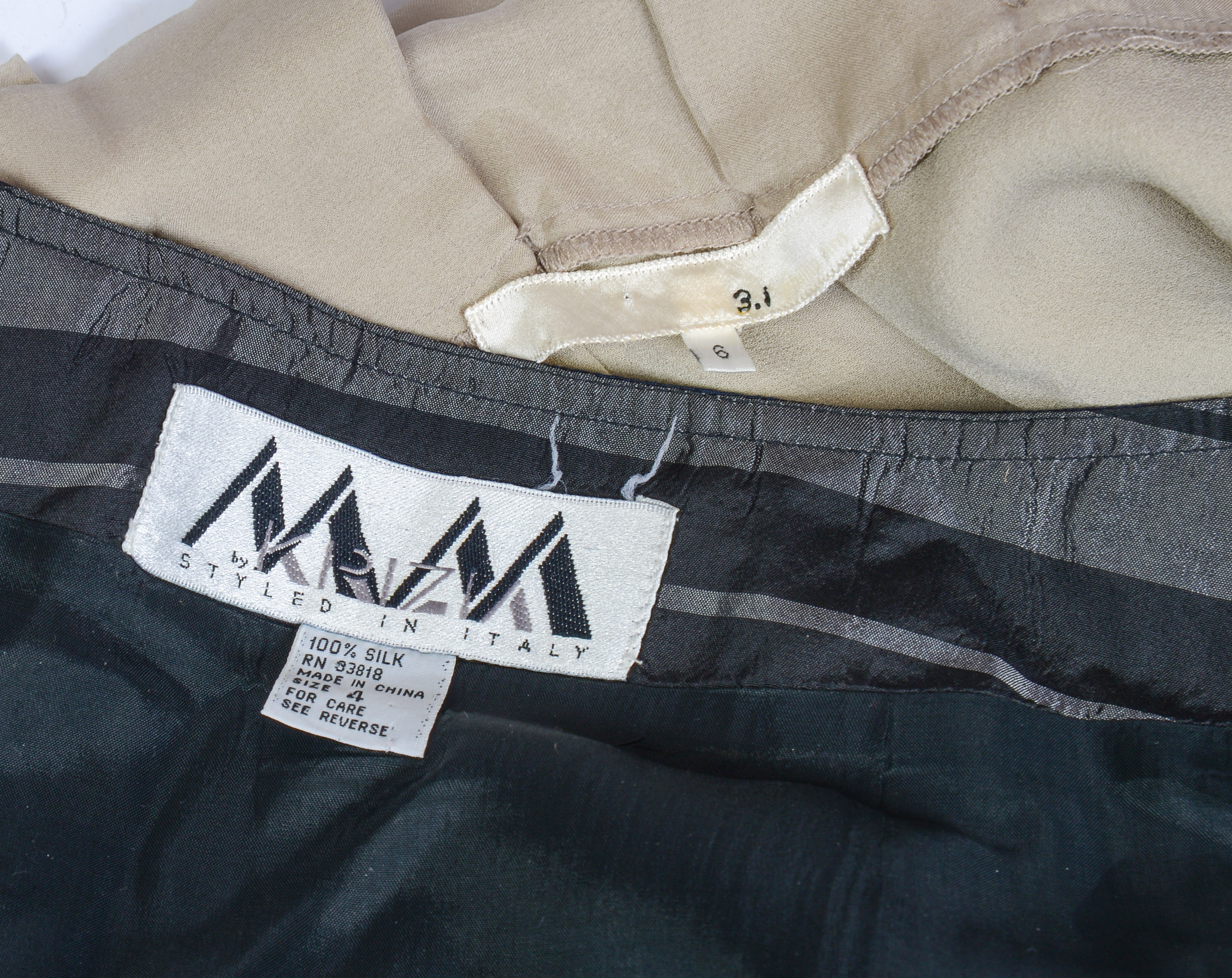 TWO SILK DESIGNER SKIRTS.
