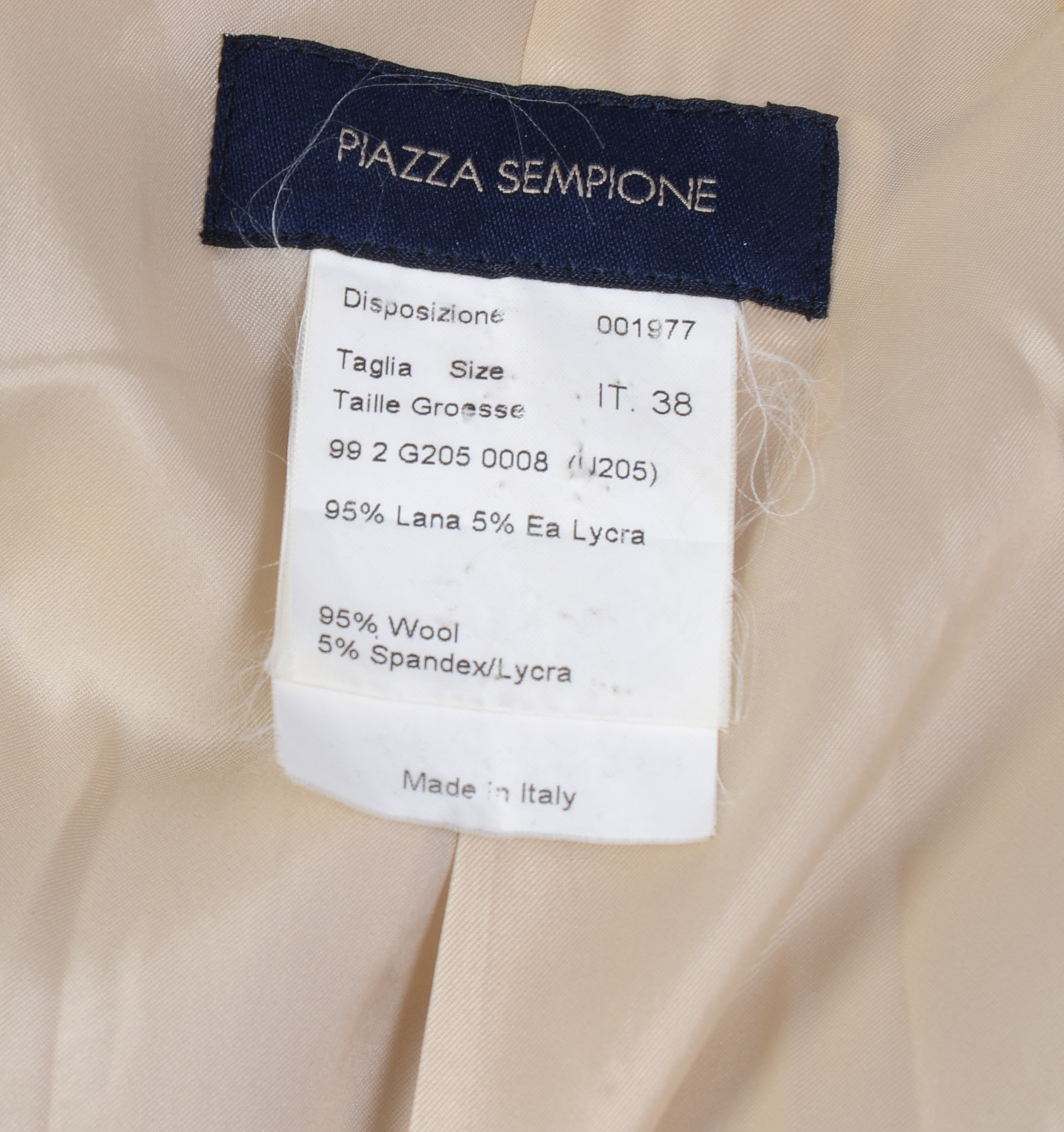 PIAZZA SEMPIONE BLAZER AND A RENE LEZARD BLOUSE.