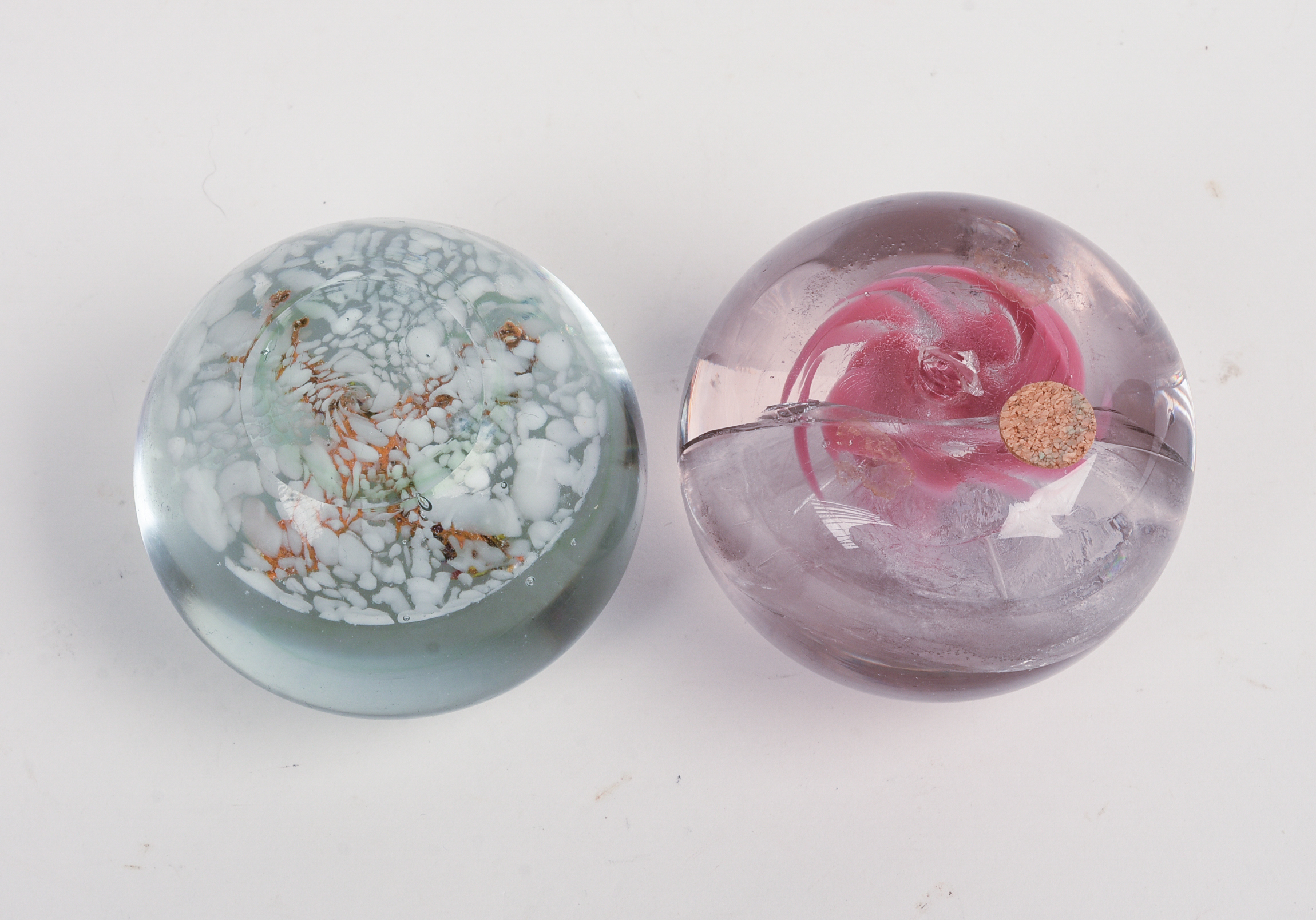 Two Glass Paperweights.