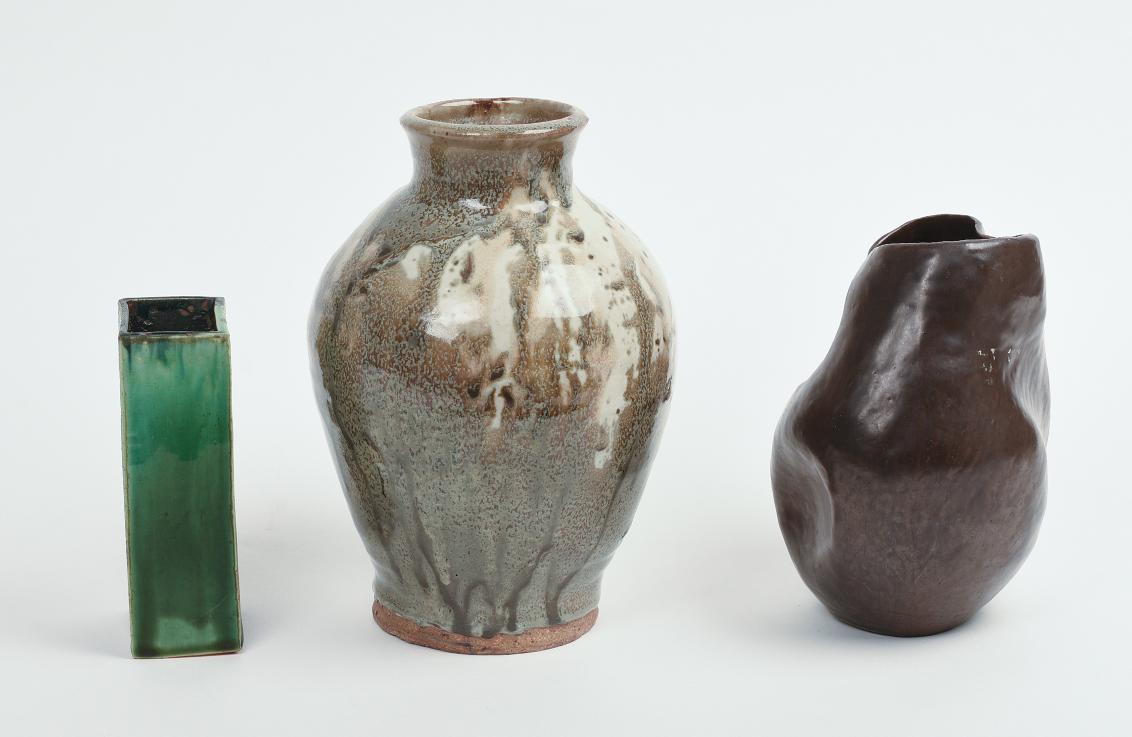 THREE STUDIO POTTERY VASES.