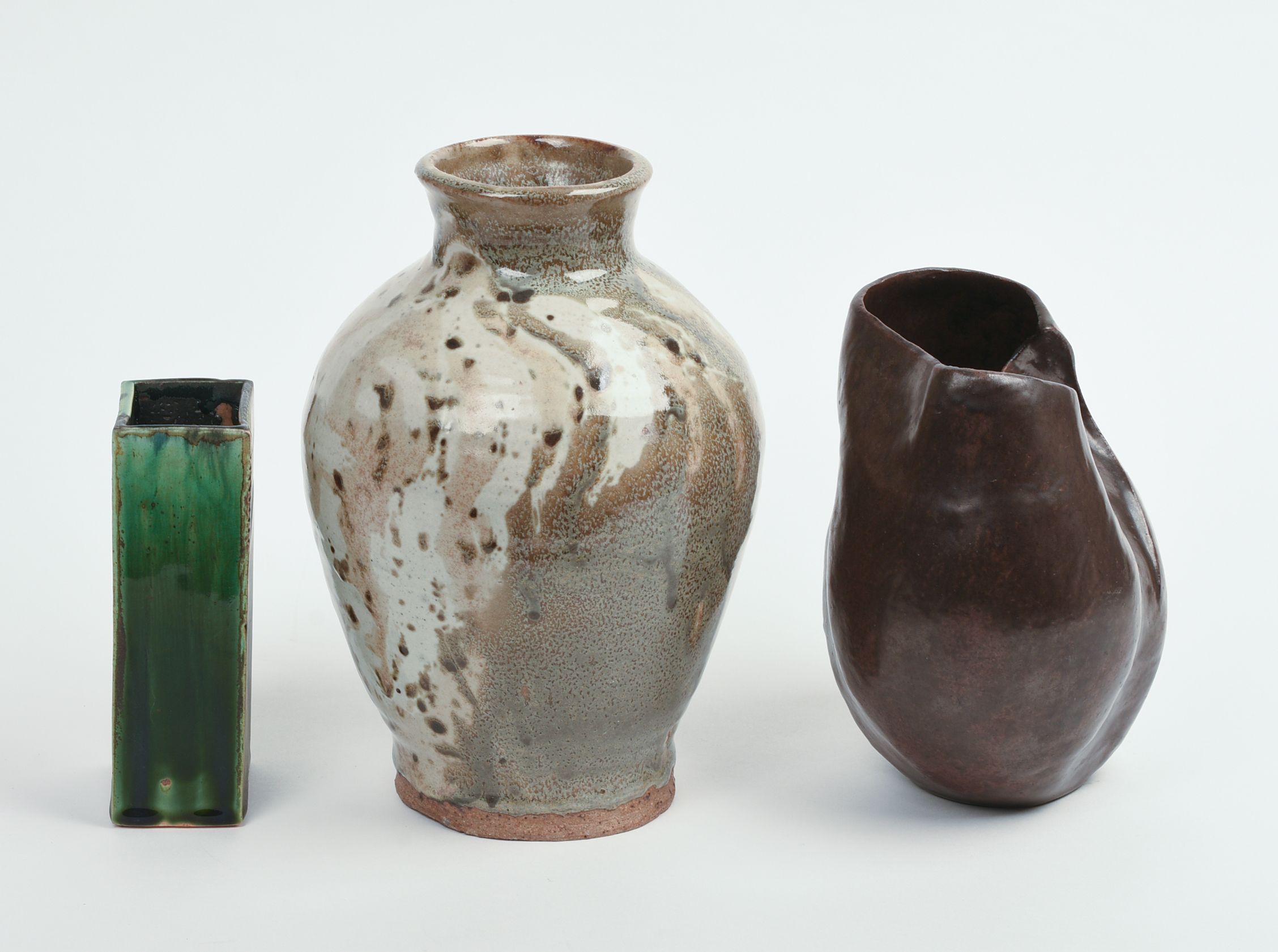 THREE STUDIO POTTERY VASES.