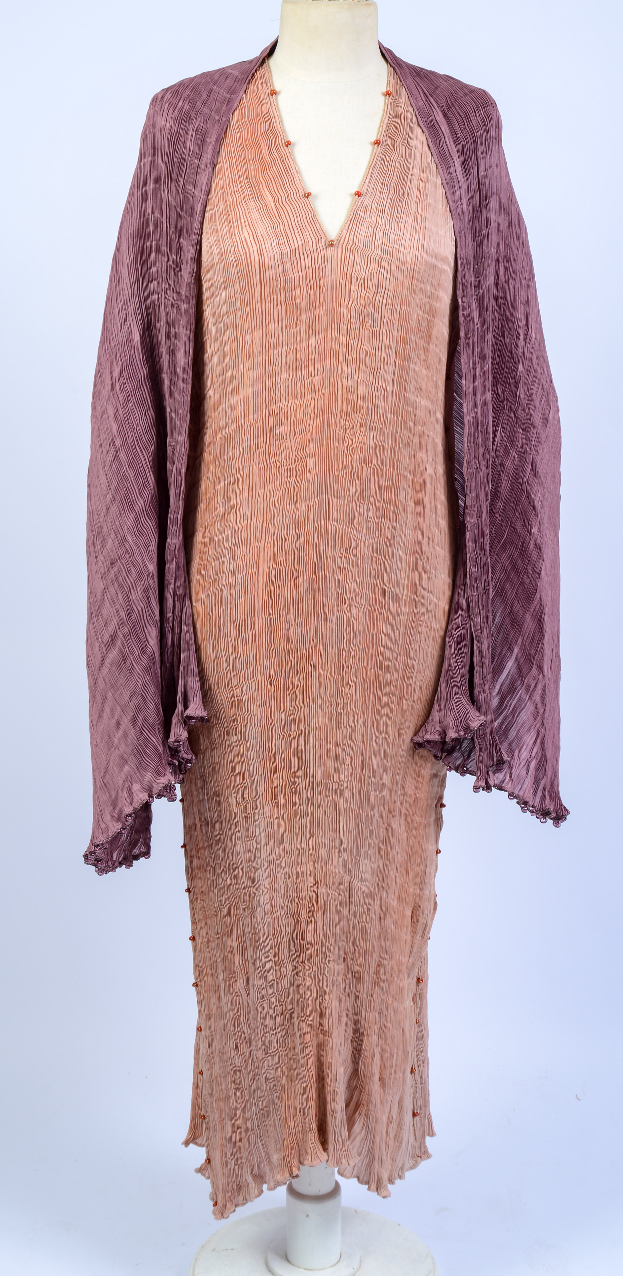 FORTUNY DELPHOS GOWN AND A SHAWL.
