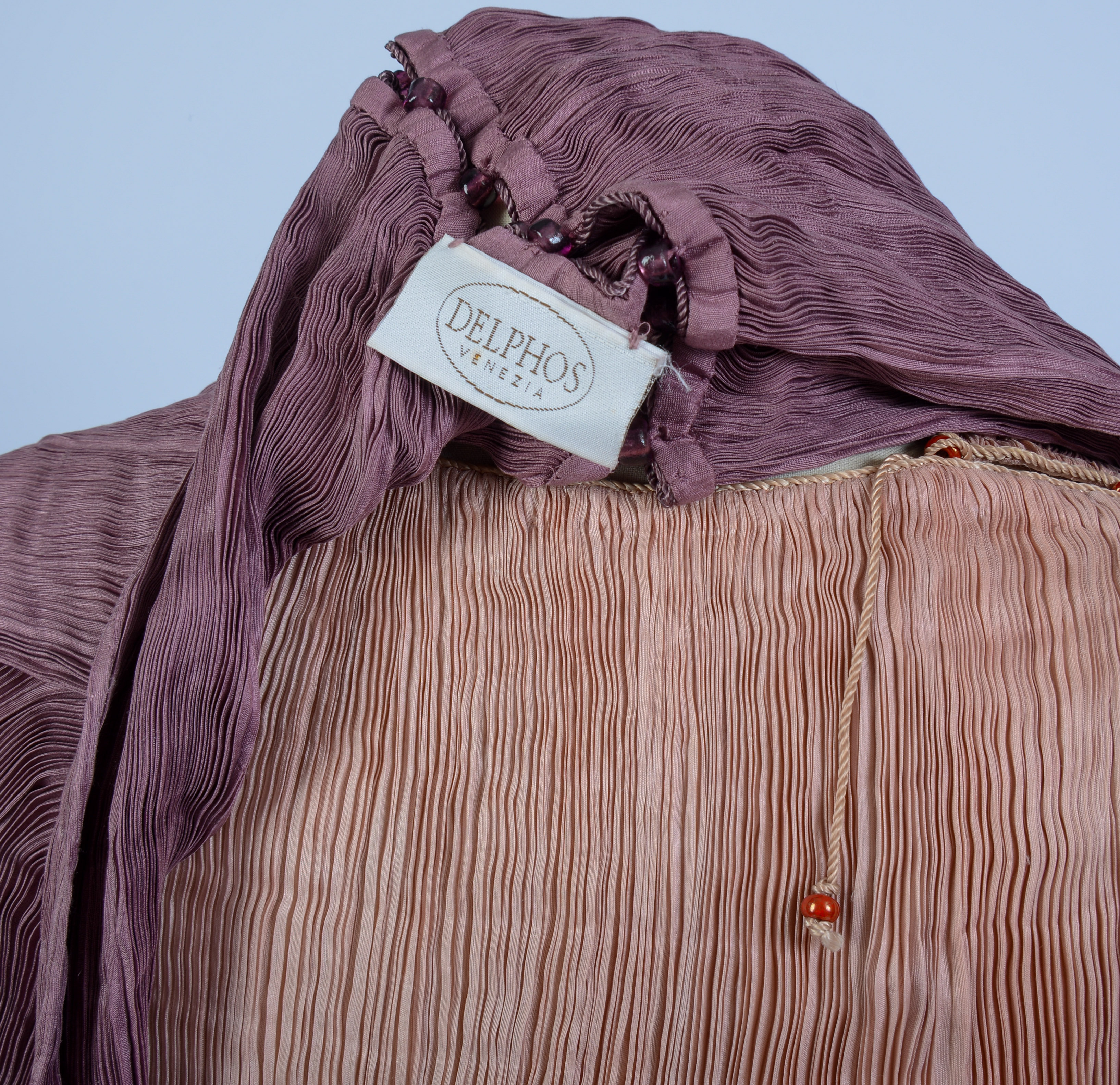 FORTUNY DELPHOS GOWN AND A SHAWL.