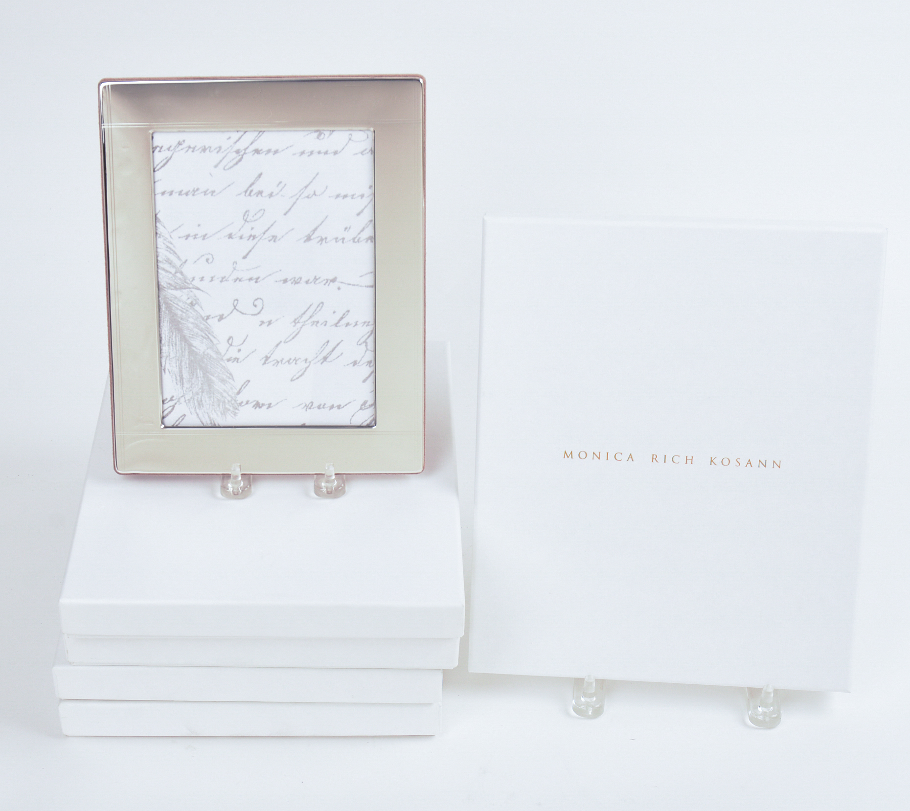 FIVE MONICA RICH KOSANN 5X7 STERLING SILVER PICTURE FRAMES.