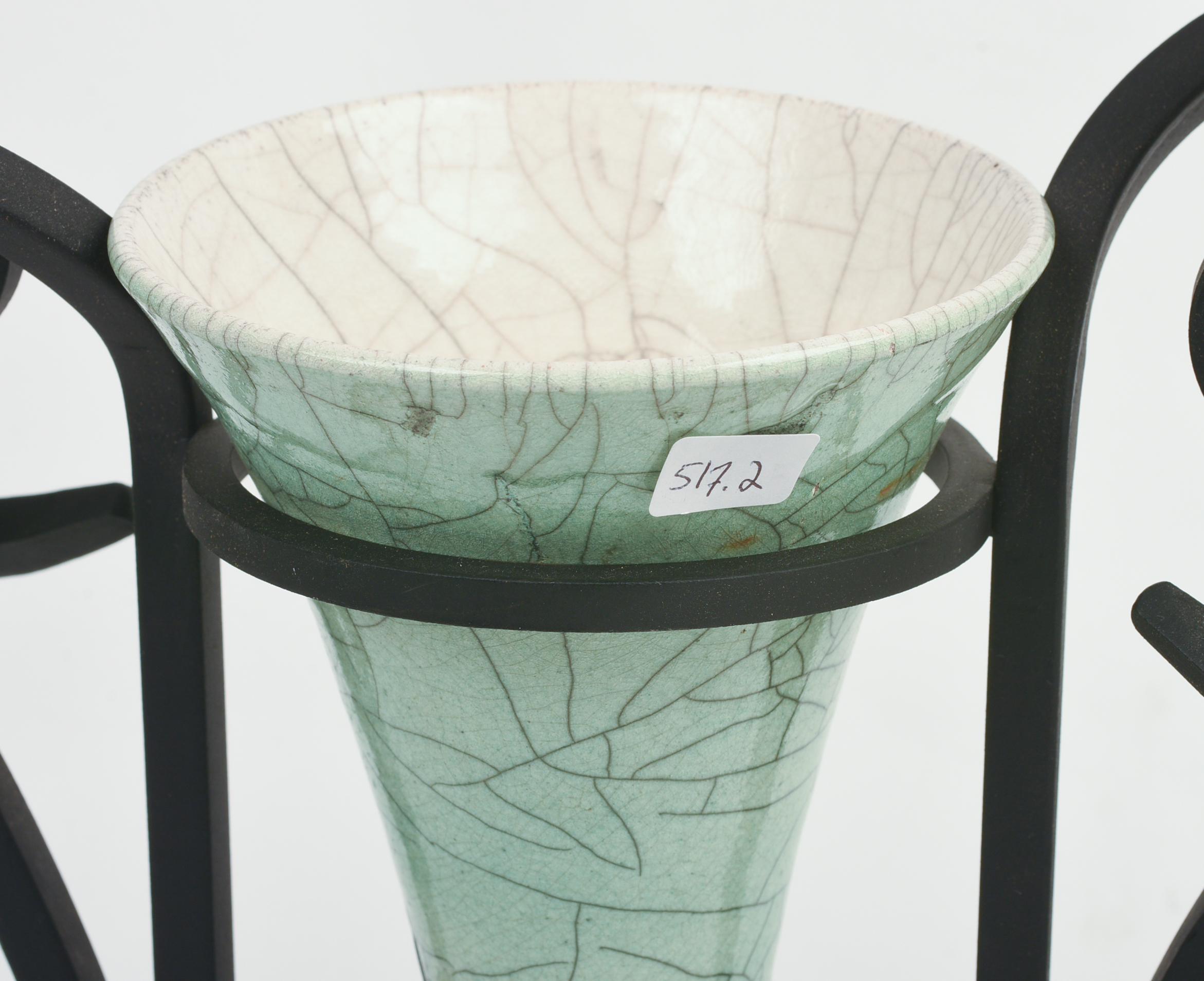 STUDIO POTTERY VASE WITH WROUGHT IRON CANDLESTICKS.