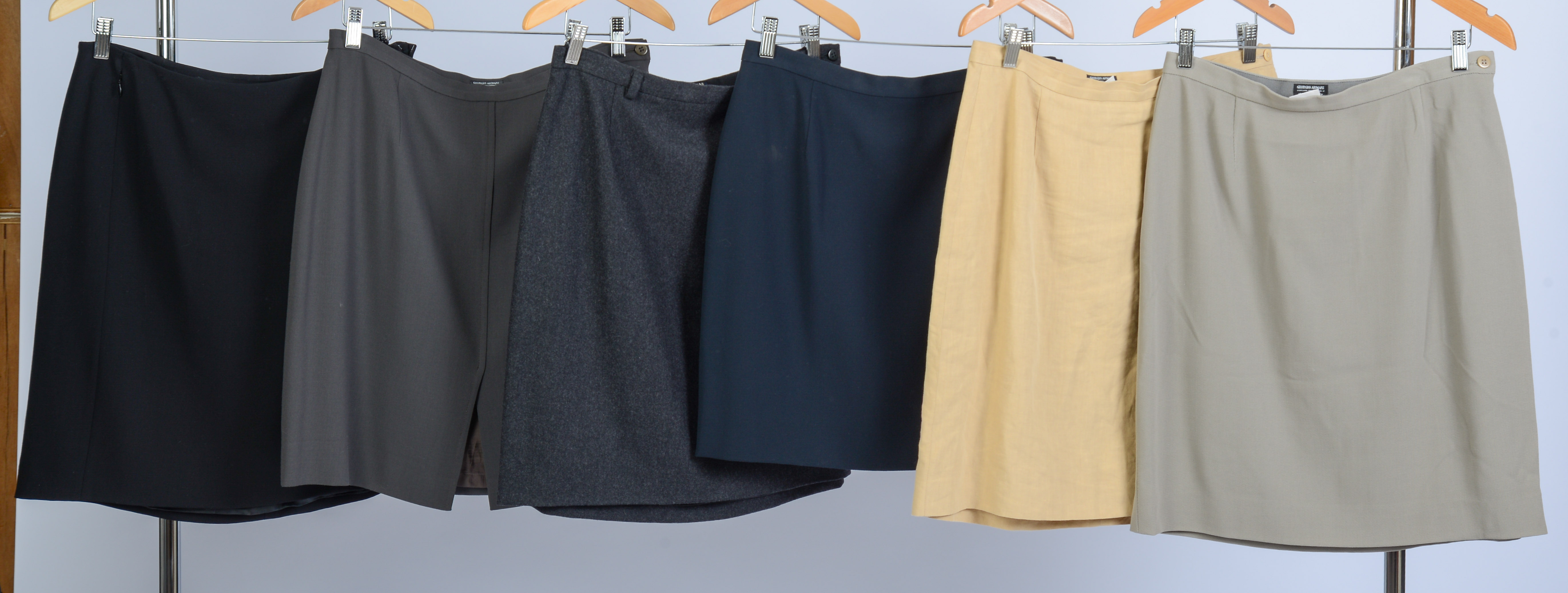 SIX GIORGIO ARMANI SKIRTS, SIZES 46 AND 48.