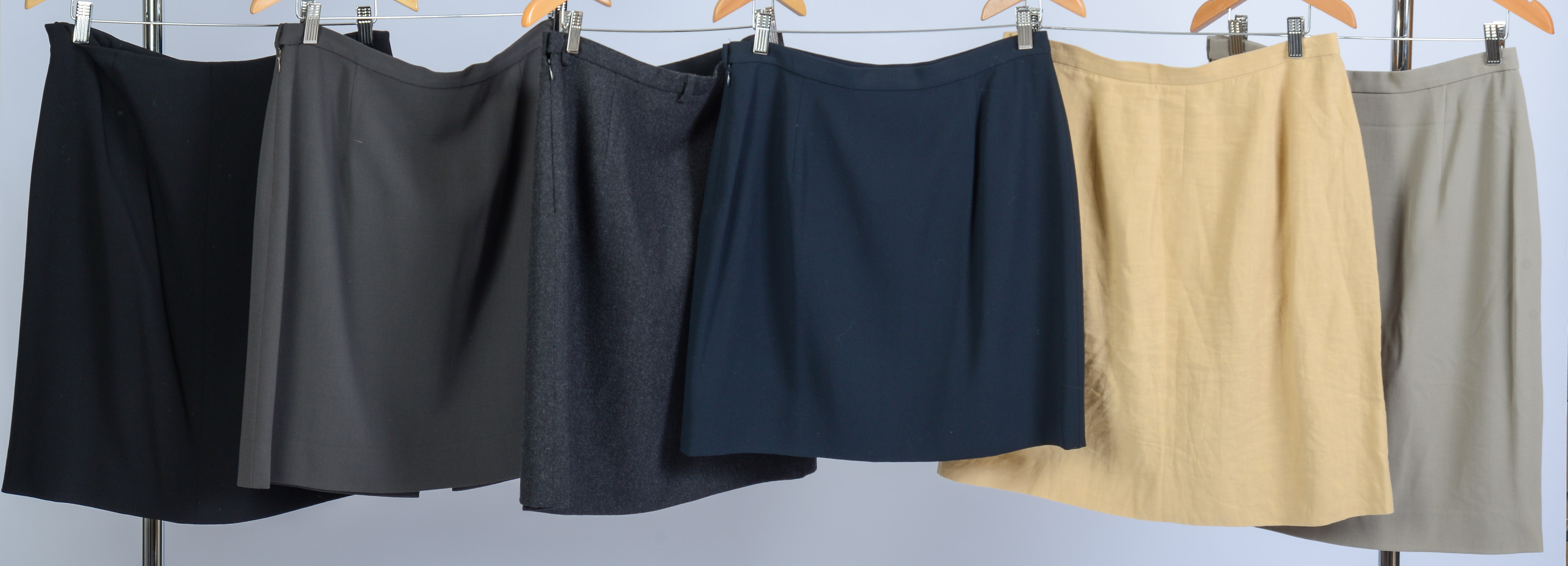 SIX GIORGIO ARMANI SKIRTS, SIZES 46 AND 48.