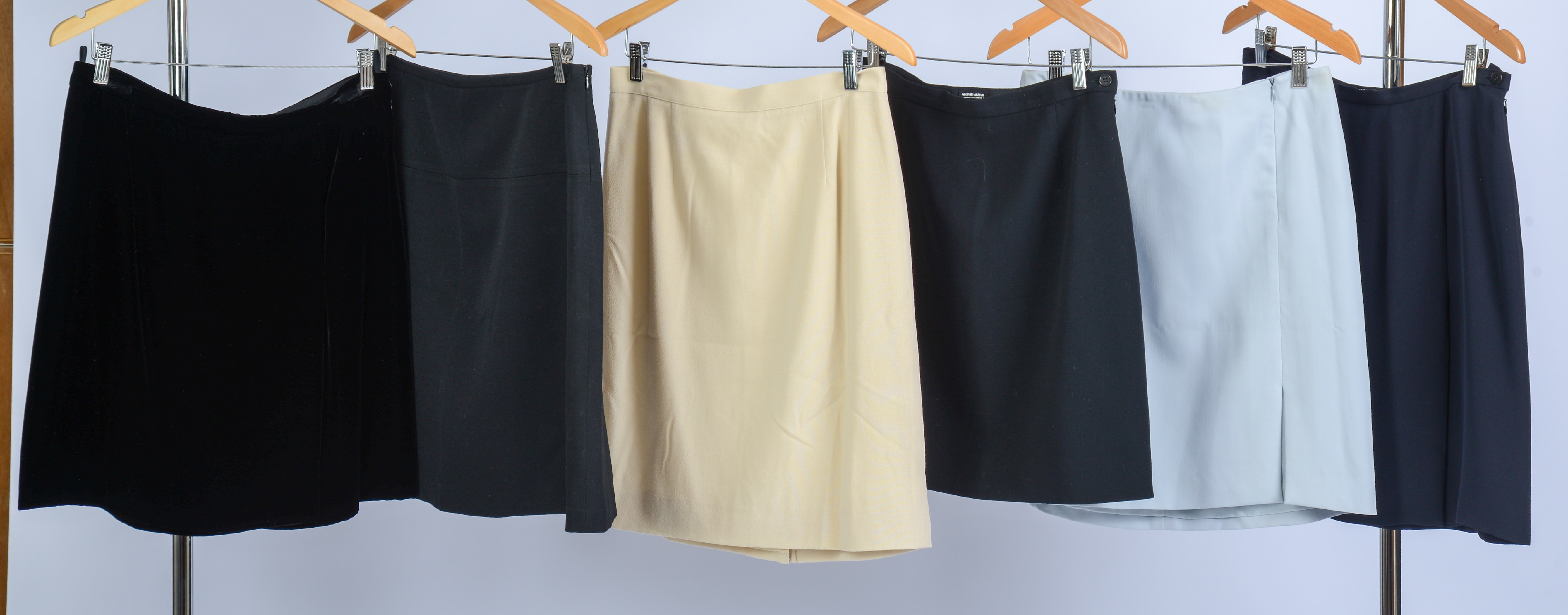 SIX GIORGIO ARMANI SKIRTS, SIZES 46 AND 48.
