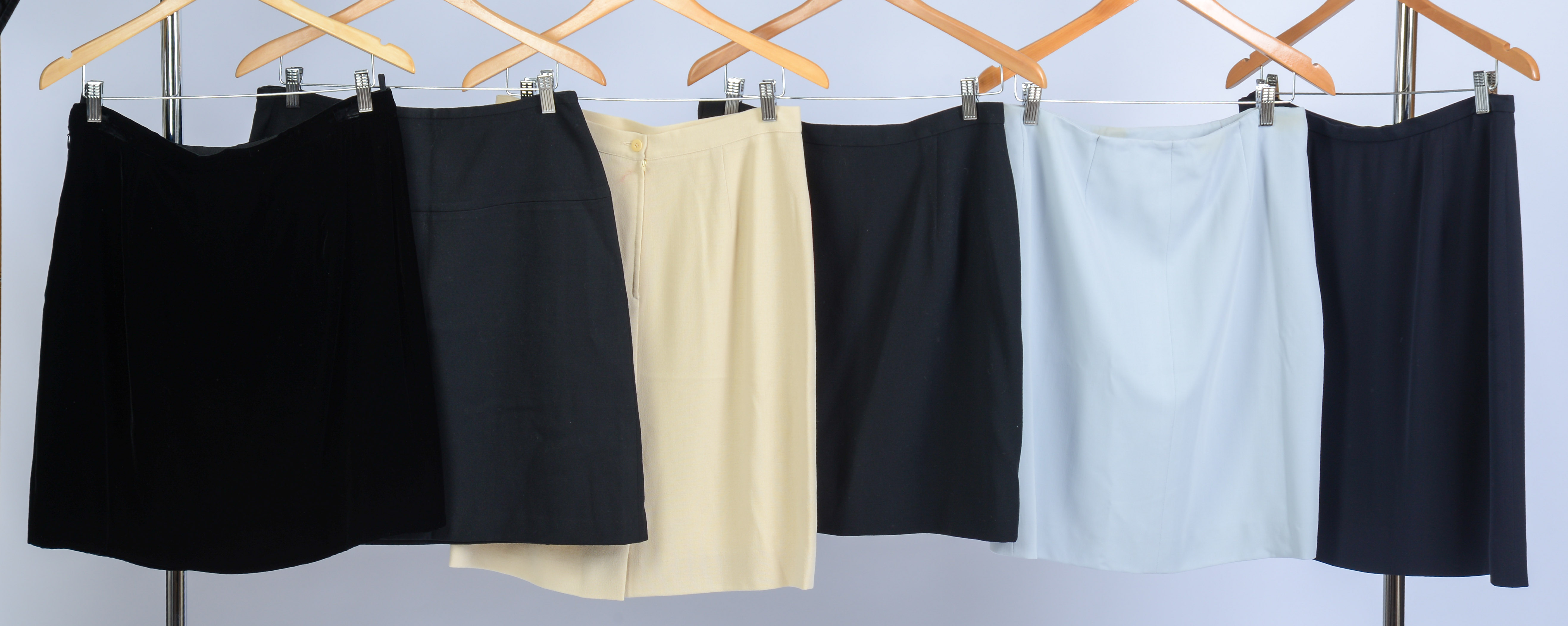 SIX GIORGIO ARMANI SKIRTS, SIZES 46 AND 48.