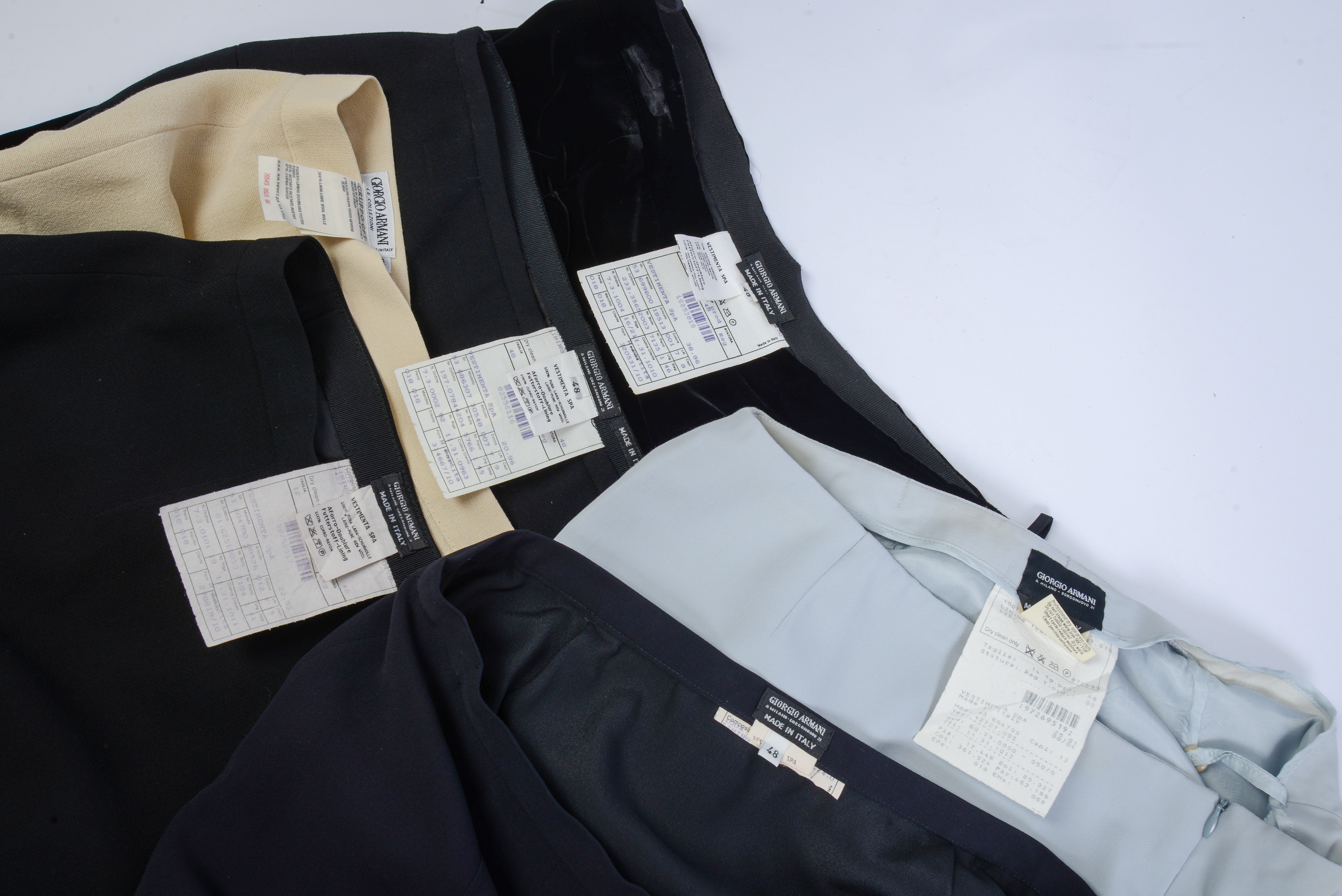 SIX GIORGIO ARMANI SKIRTS, SIZES 46 AND 48.