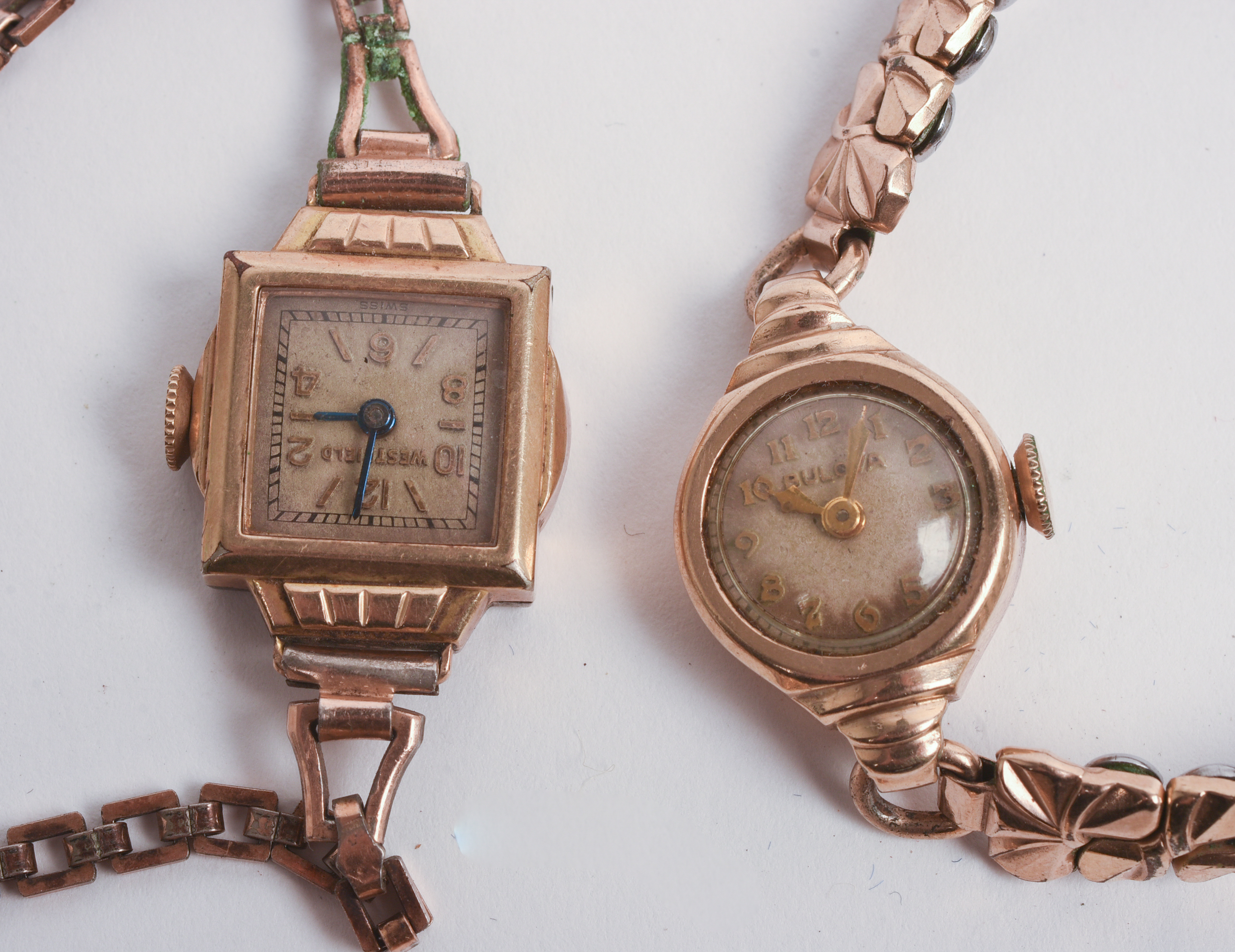 THREE ROLLED GOLD LADIES WATCHES.