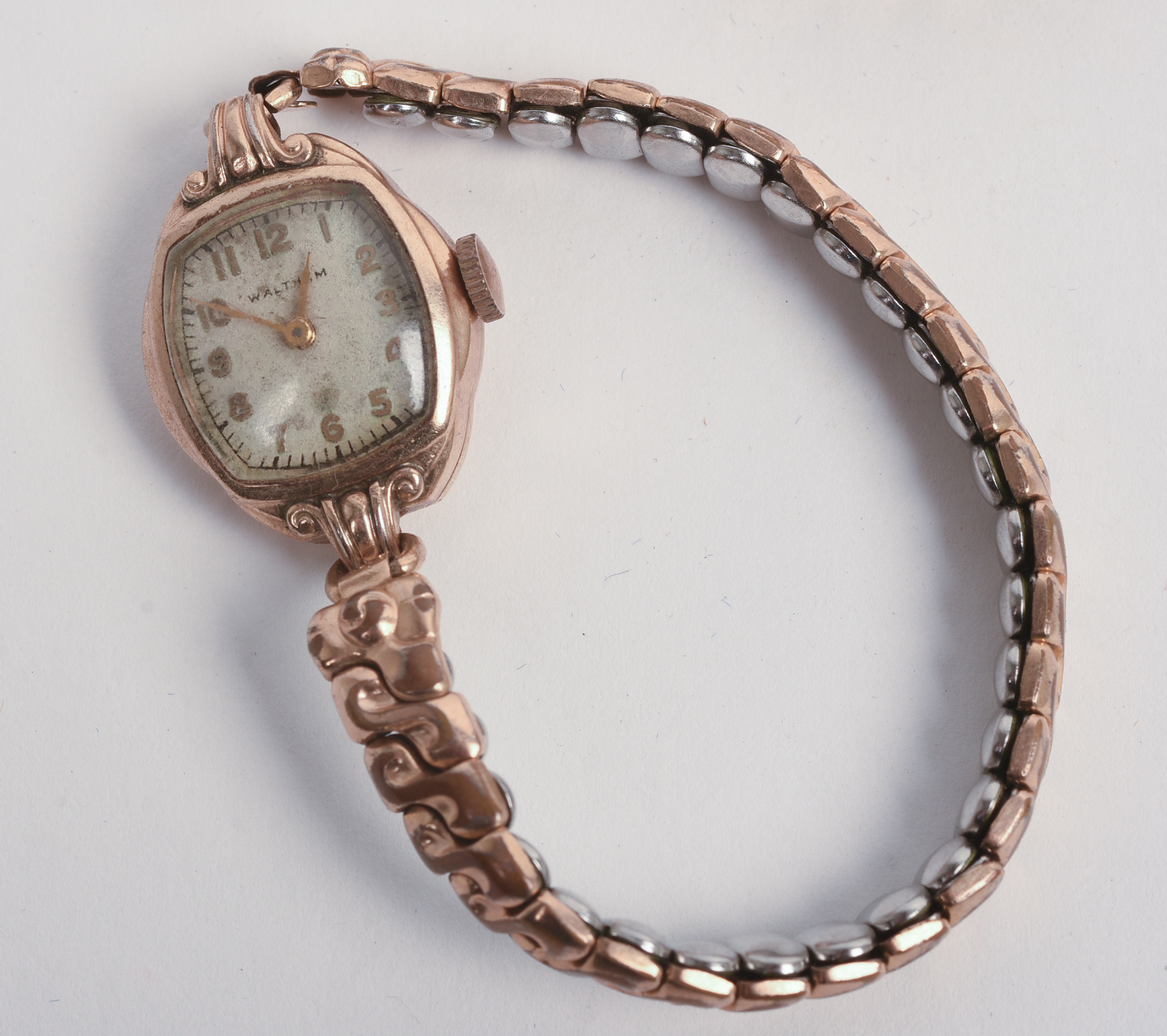 THREE ROLLED GOLD LADIES WATCHES.