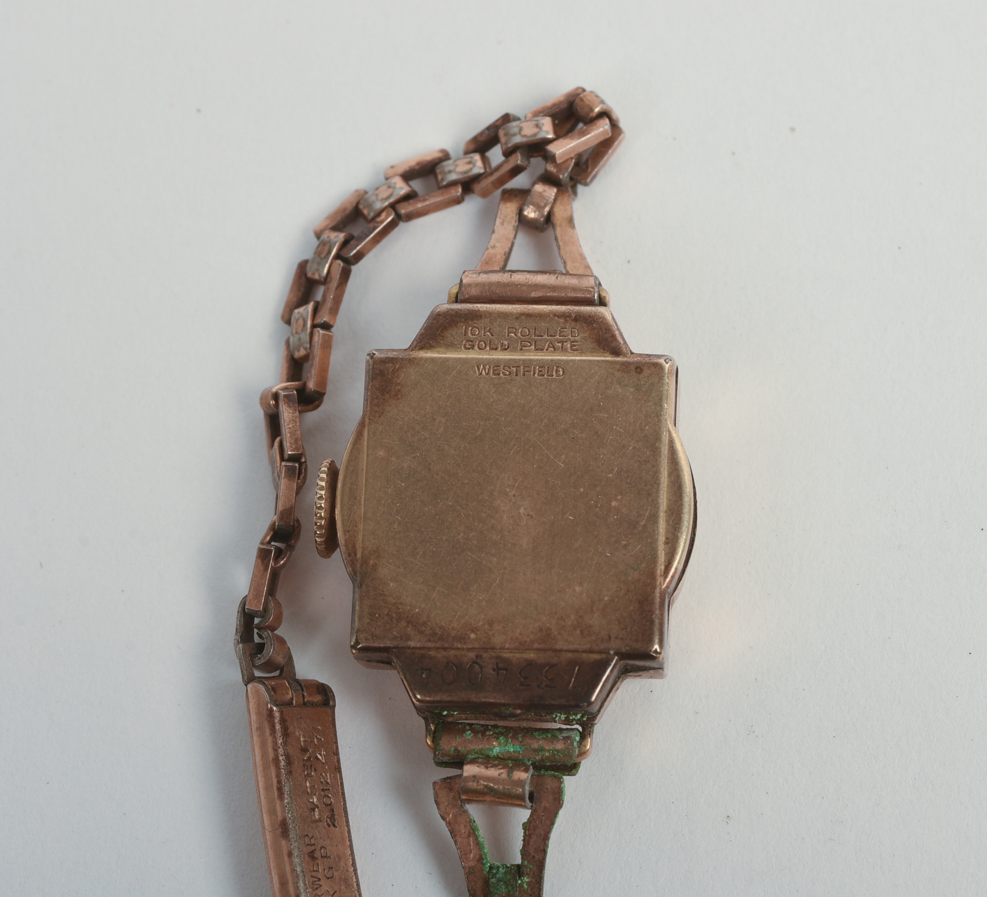 THREE ROLLED GOLD LADIES WATCHES.