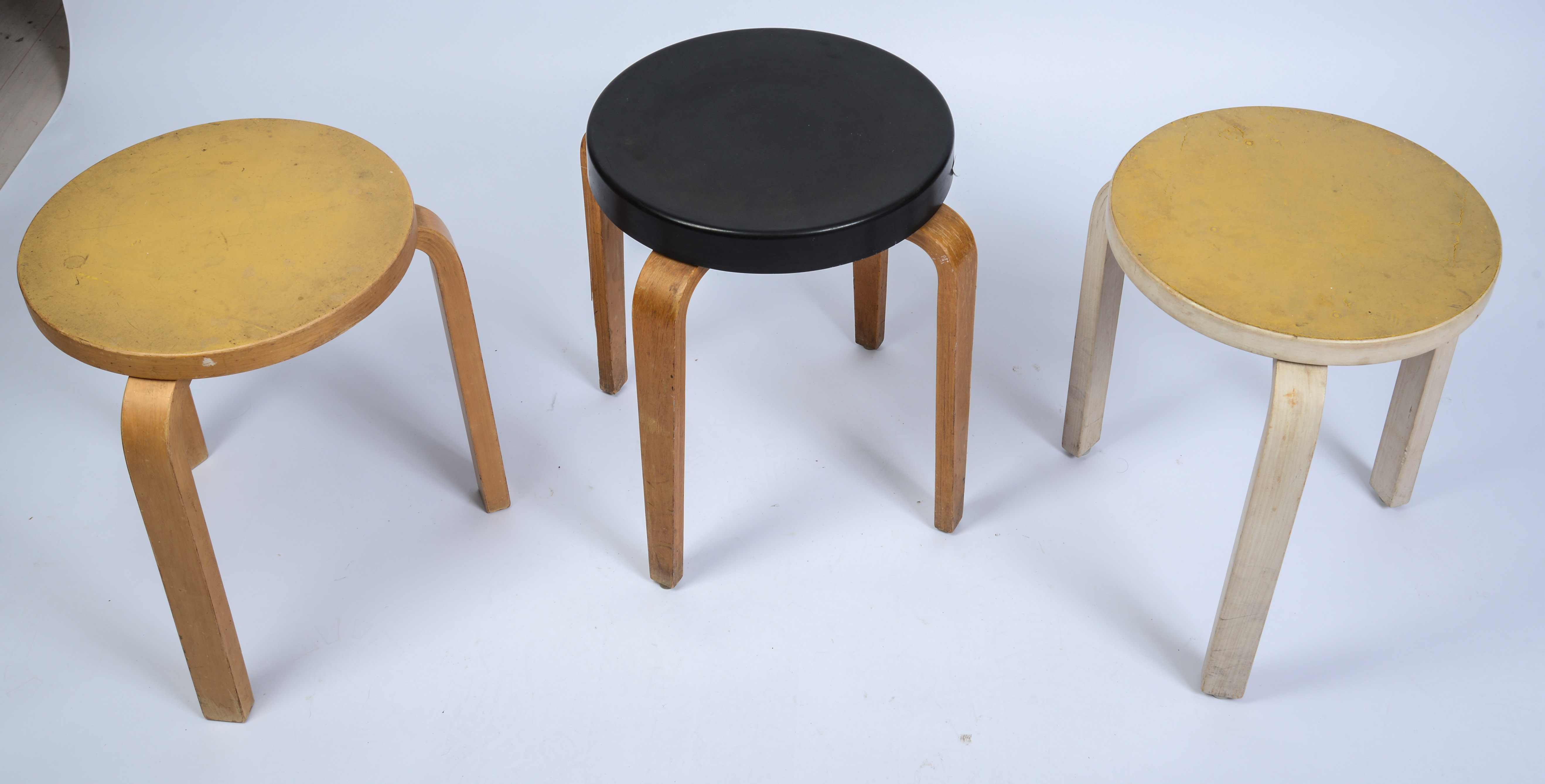 THREE MID CENTURY STOOLS.