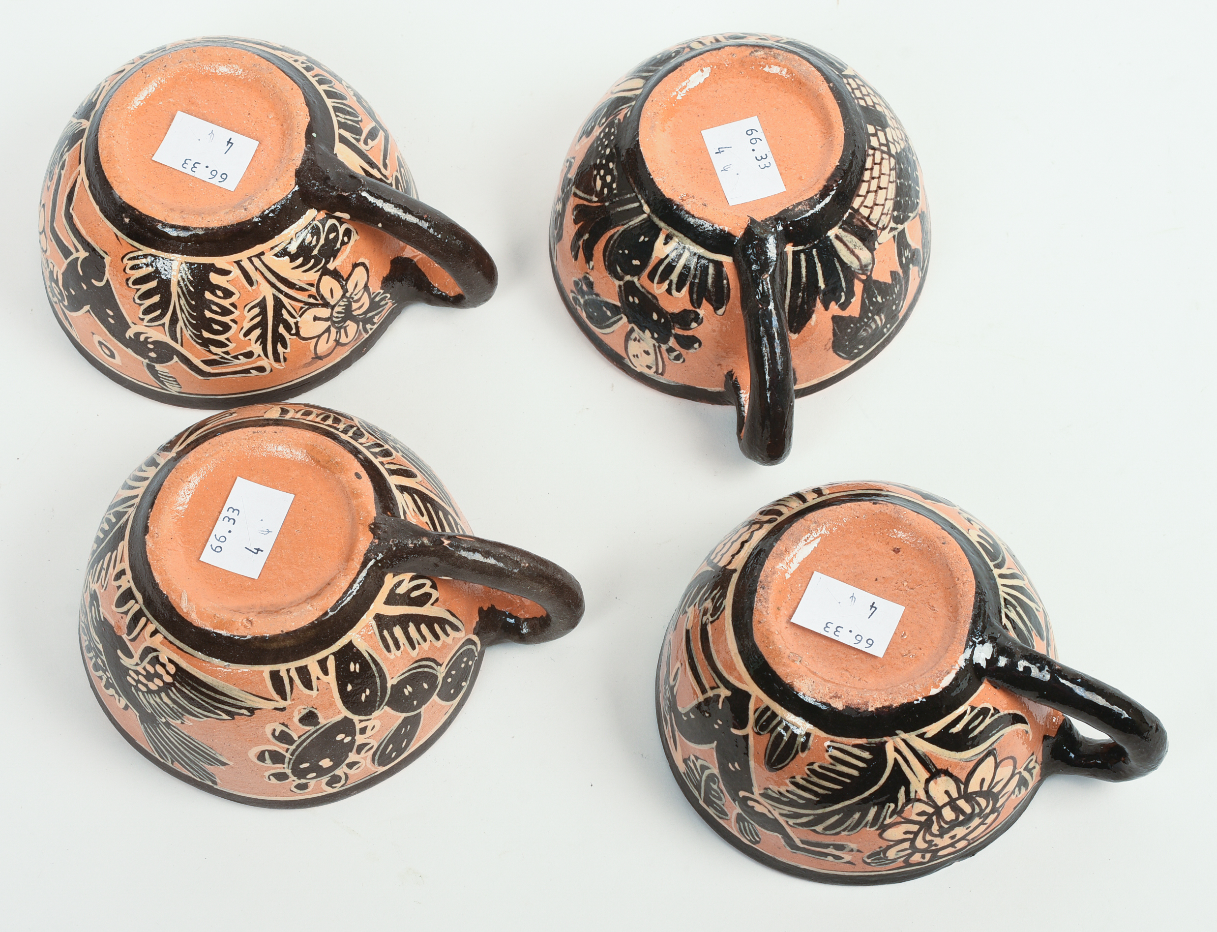 FOUR MEXICAN TLAQUEPAQUE POTTERY CUPS