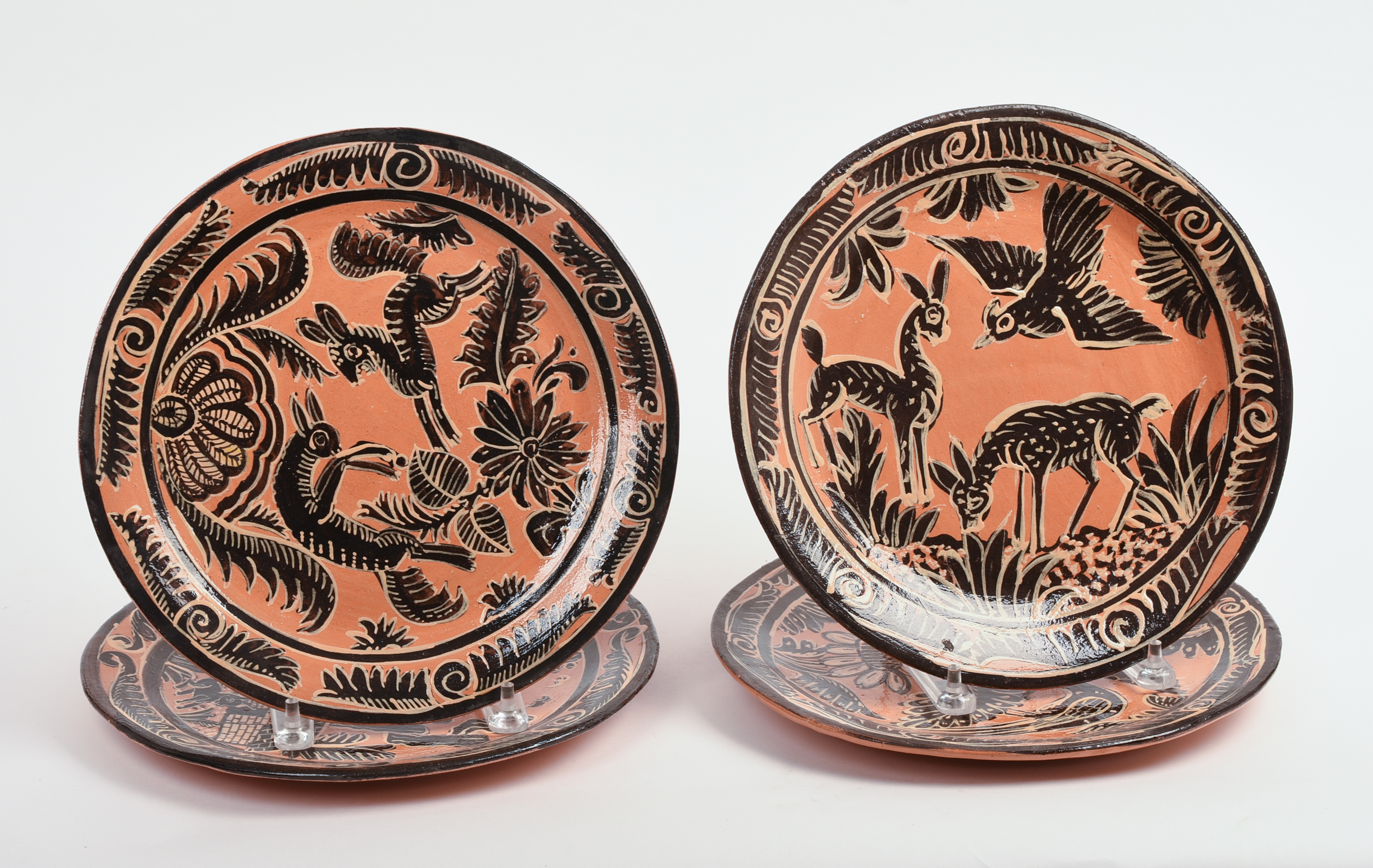FOUR MEXICAN TLAQUEPAQUE POTTERY DINNER PLATES