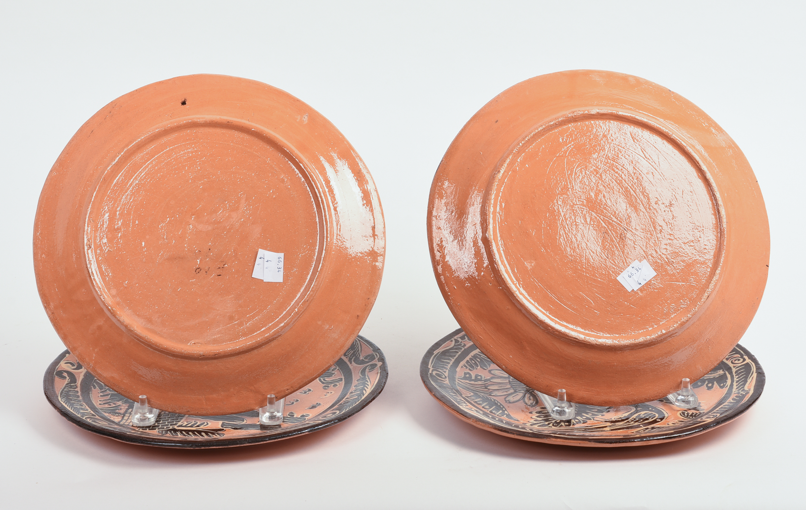 FOUR MEXICAN TLAQUEPAQUE POTTERY DINNER PLATES