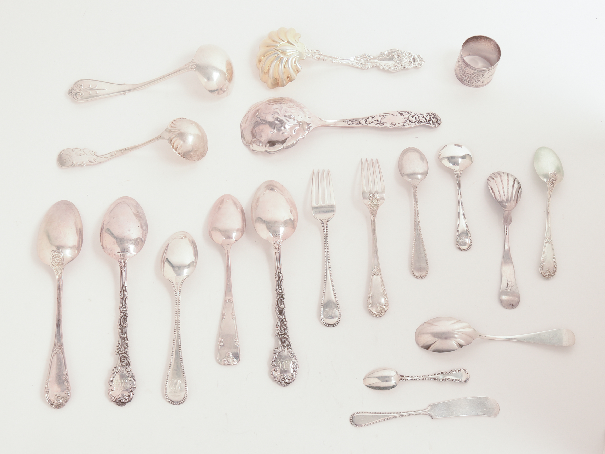 COLLECTION OF STERLING SILVER FLATWARE.