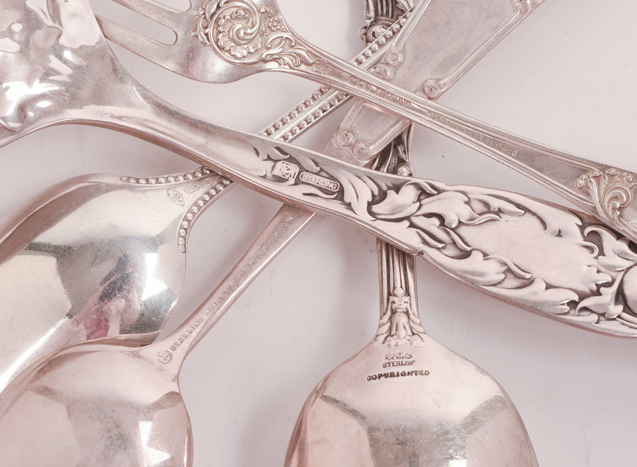 COLLECTION OF STERLING SILVER FLATWARE.