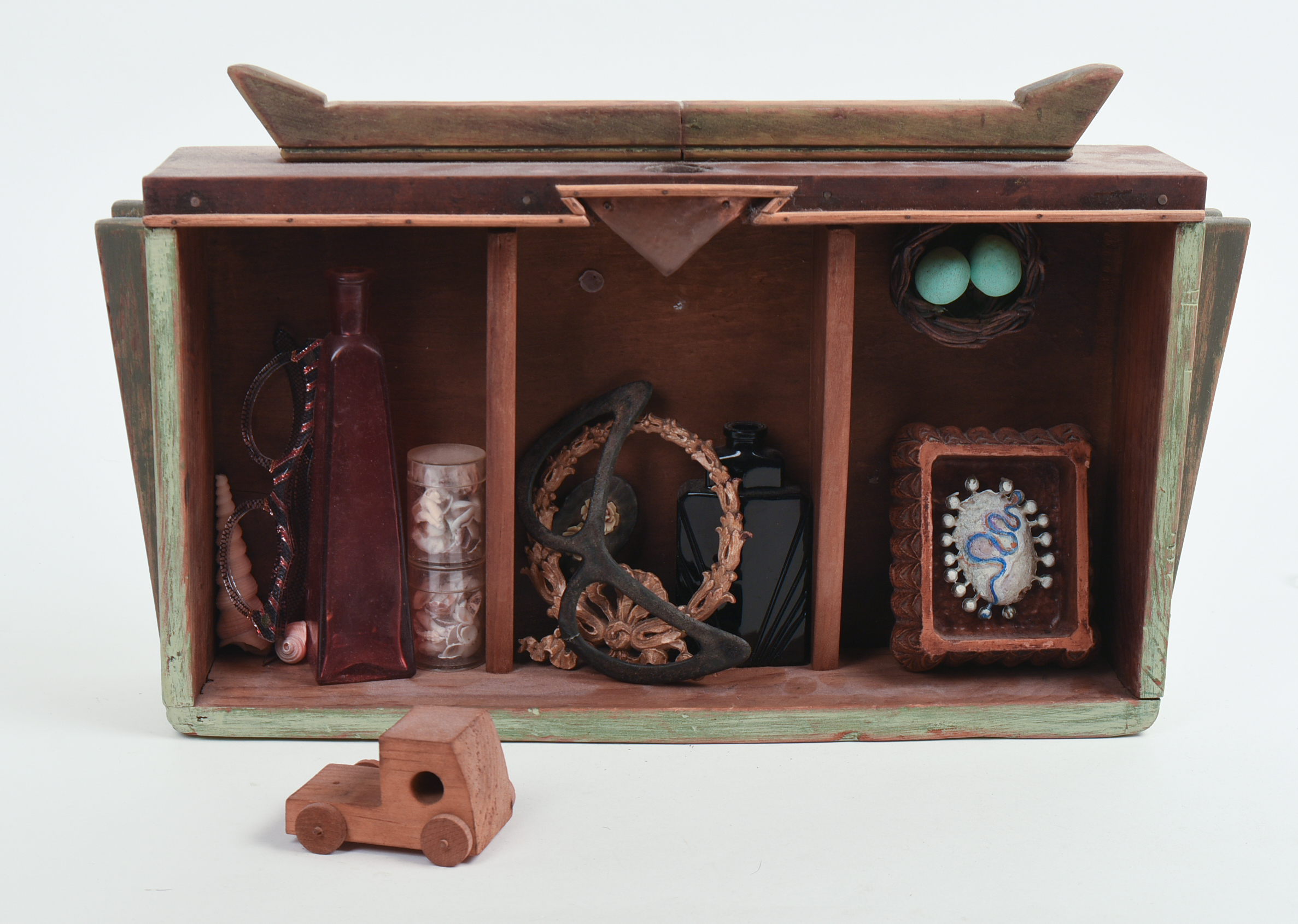 MODERN SHADOW BOX WITH ASSEMBLED ITEMS.