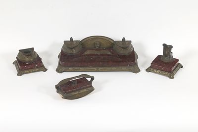 NECESSAIRE DE BUREAU dans le style Art nouveau
Compos&eacute; de deux encriers, un porte-lettres, un 