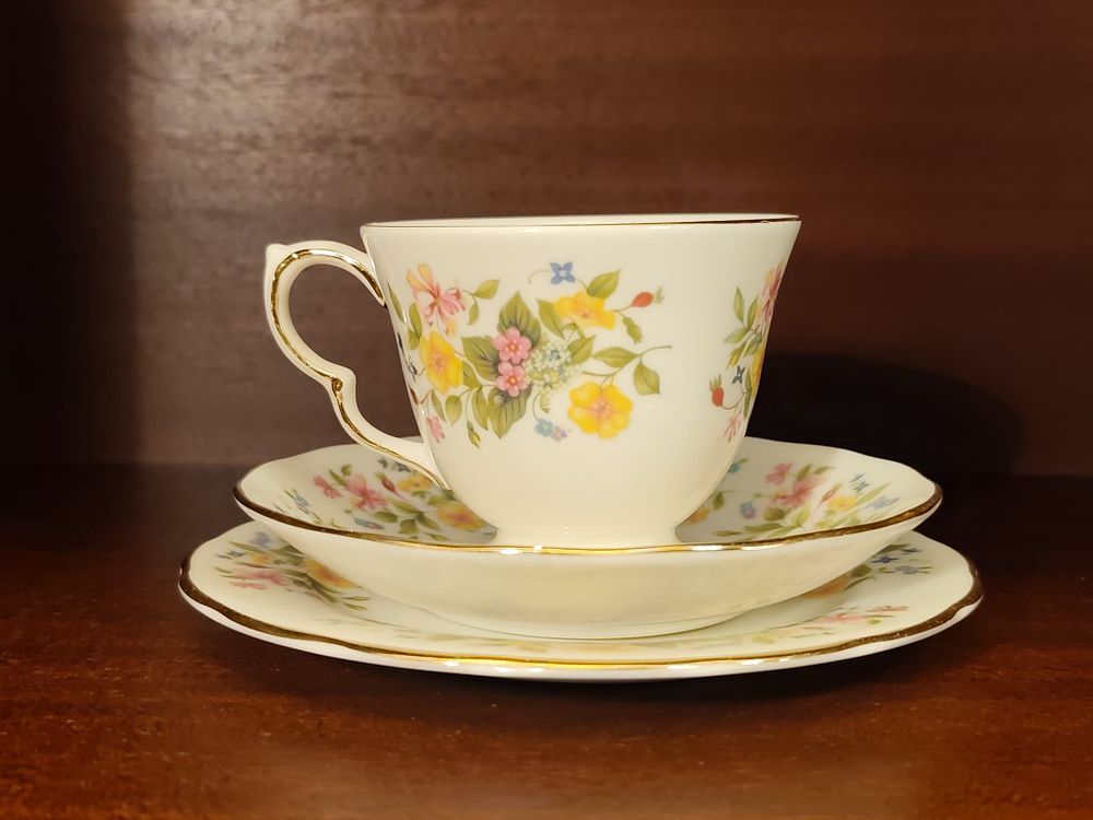 Colclough bone china tea-set trio.