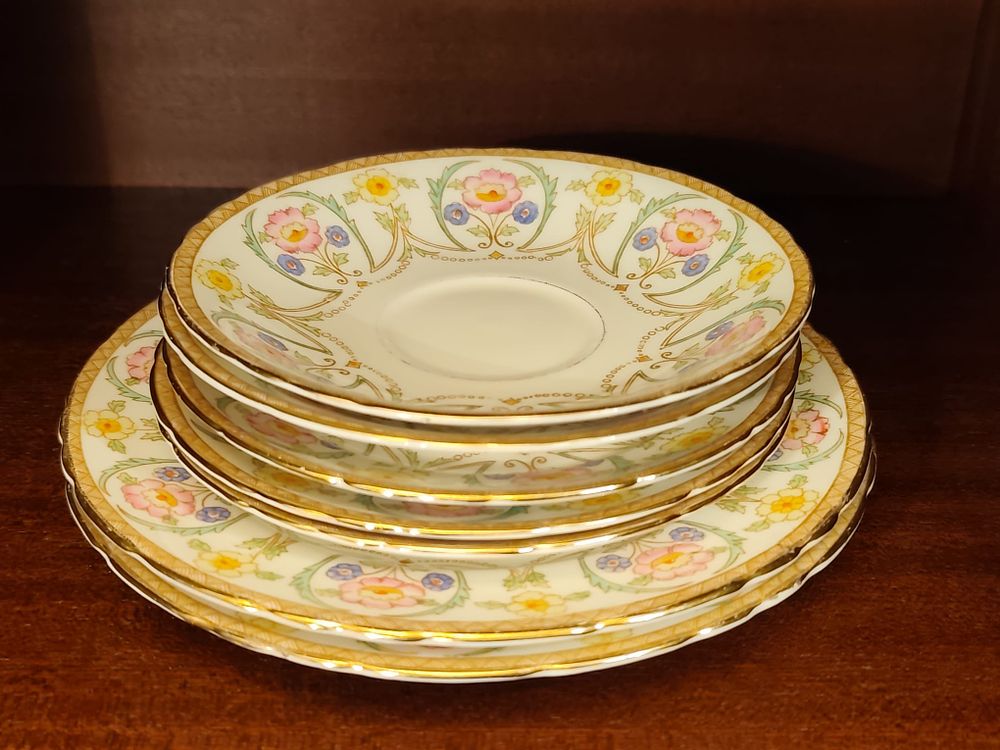 Sutherland china five saucers and two side plates.