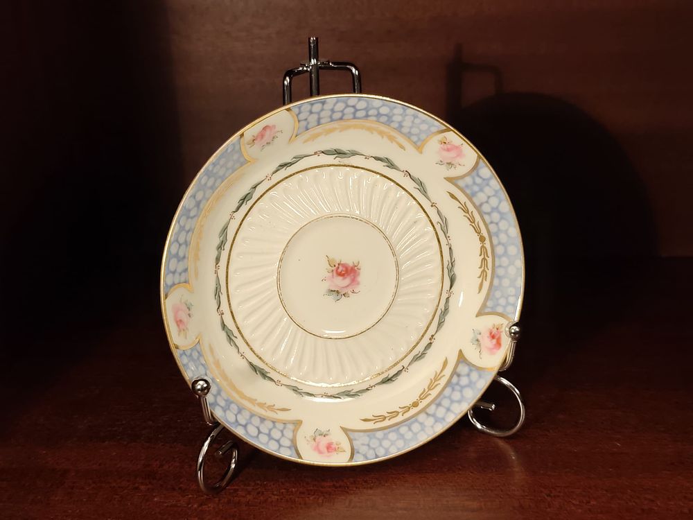 Vintage Royal Crown Derby saucer.