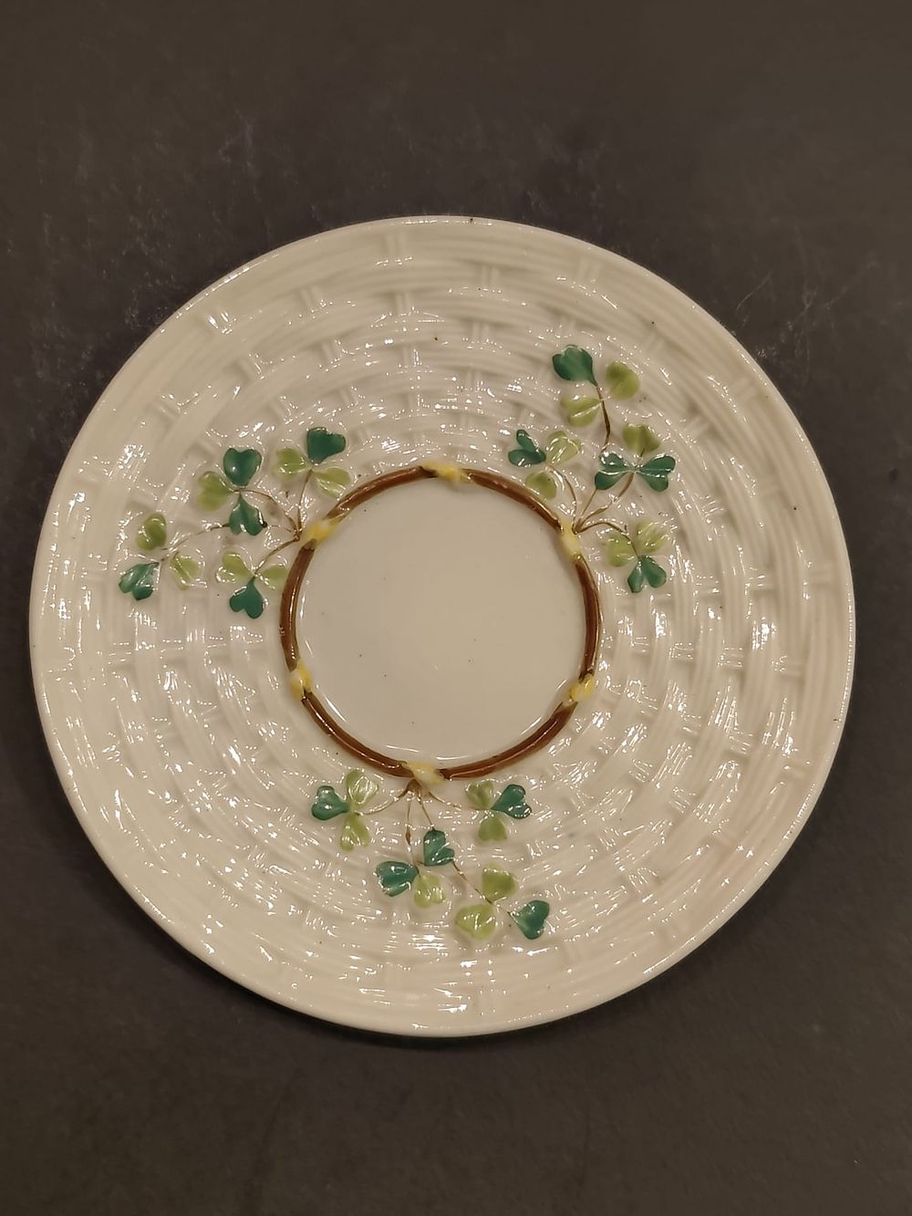 Belleek small saucer. Fields of Shamrock pattern. 2nd period. Black Mark (1891-1926). Diameter: 