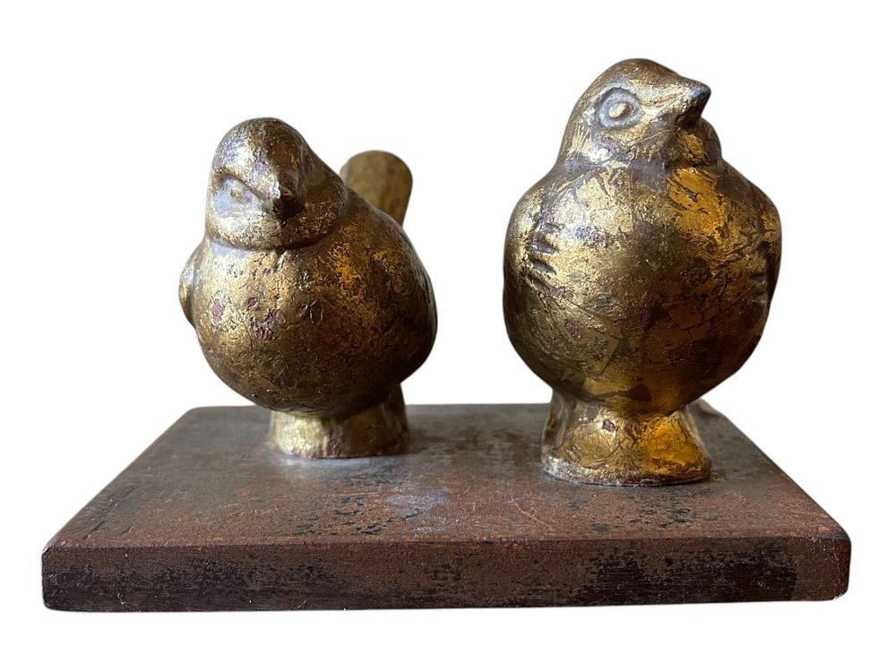 A Pair of Stylized Gilt Metal Birds on a Cast Iron Base. 5 x 3.5 A decorative figural sculpture 