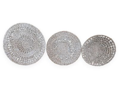 A Set of Three Graduated Silver-Toned Woven Natural Fiber Placemats. 18 x 20 x 24 A set of three 