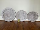 A Set of Three Graduated Silver-Toned Woven Natural Fiber Placemats. 18 x 20 x 24 A set of three Image - 1