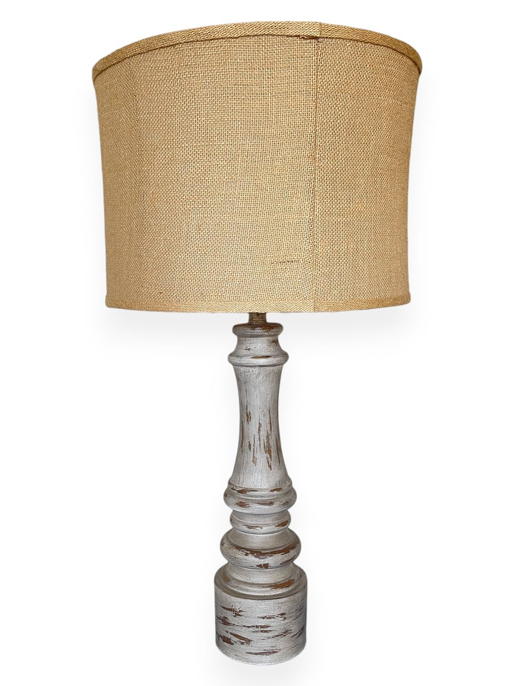 A Fangio Lighting Distressed Resin Table Lamp with Burlap Shade. 16 x 32 A Distressed Resin 