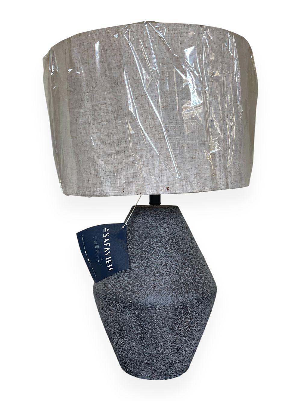 A Safavieh Contemporary Table Lamp, Model TBL4367A, May 2024. A contemporary Safavieh table lamp 