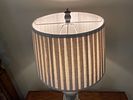 Distressed Grey Baluster Table Lamp with Striped Fabric Shade. 15 x 33 
A decorative table lamp Image - 9