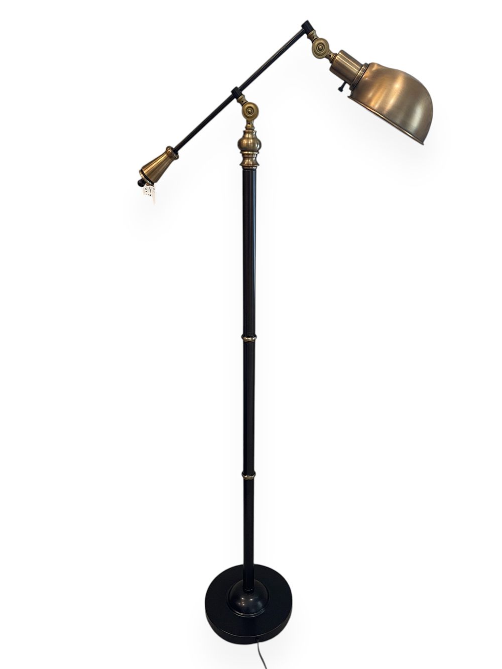 A Two-Tone Industrial Style Articulated Floor Lamp. 56 tall A two-tone metal floor lamp 