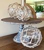 A Metal Cake Stand with Three Decorative Nautical-Style Glass Balls in Netting. This lot Image - 4