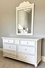 A Stanley Furniture Two-Piece White-Painted Dresser and Mirror Set. A two-piece set by Stanley Image - 1