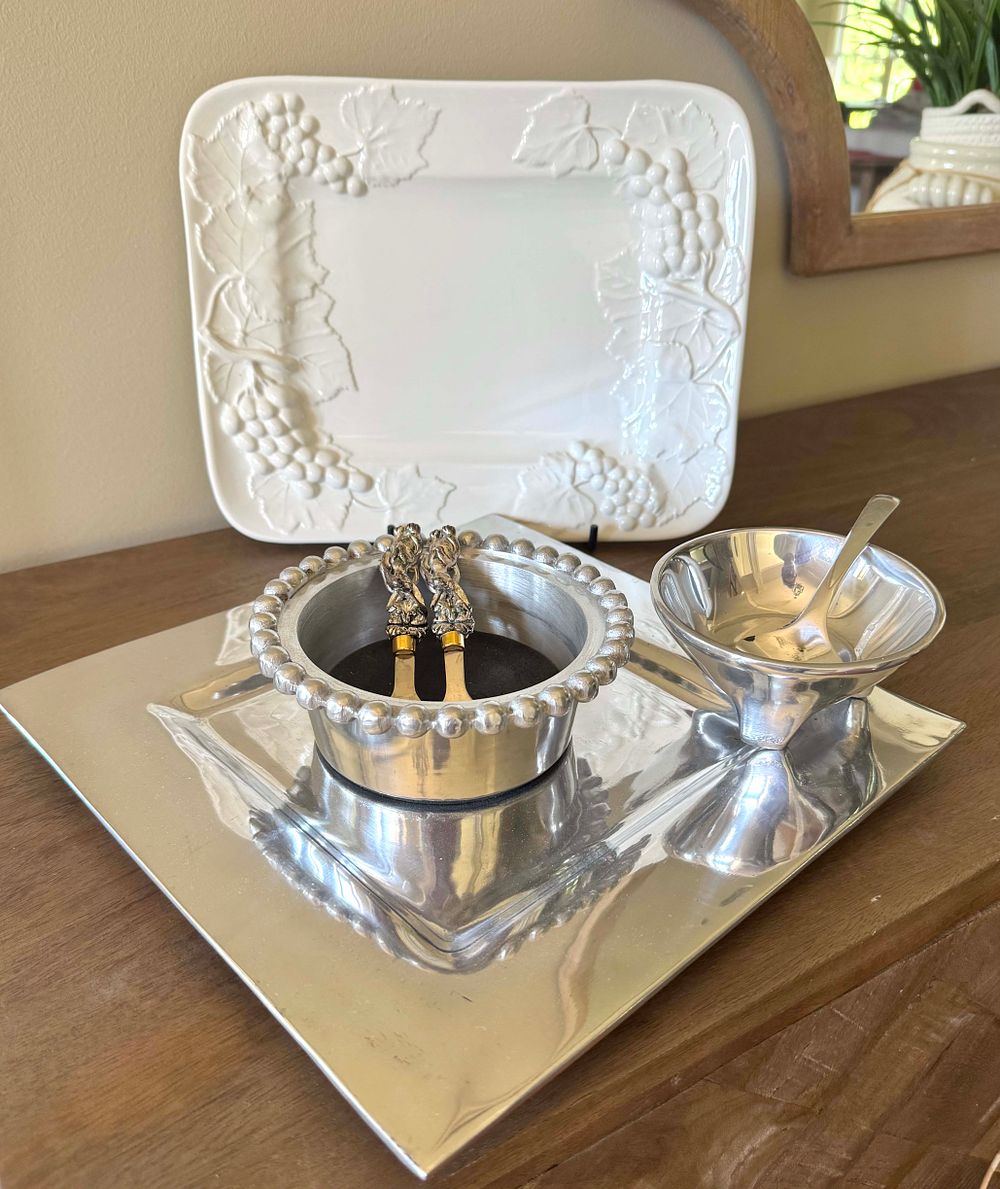 A Multi-Piece Metallic Serving Ensemble and a Pampa Bay Verona Embossed Ceramic Platter. This 