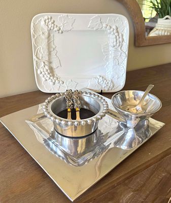 A Multi-Piece Metallic Serving Ensemble and a Pampa Bay Verona Embossed Ceramic Platter. This 