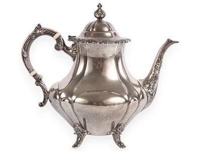 Reed & Barton "Georgian Rose" Sterling Silver Coffee Pot. An ornate metallic silver coffee pot 