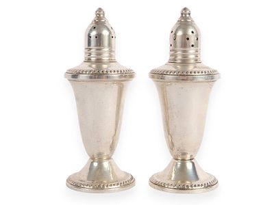A Pair of Sterling Weighted DOUCHII CREATION Shakers. A pair of silver STERLING DOUCHII CREATION 