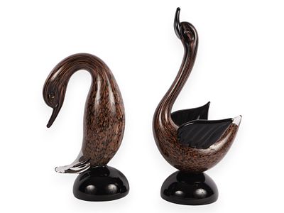 A Pair of Murano Glass Swan Figurines. A pair of dark brown and black speckled glass swan 