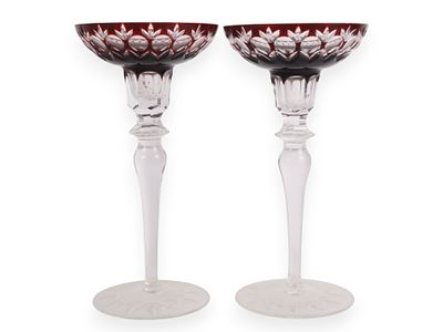 A Pair of Ruby Red Cut Crystal Candle Holders. A pair of clear and ruby red cut crystal candle 