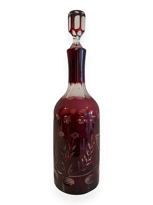 A Czech Bohemian Ruby Red Cut-to-Clear Glass Decanter with Faceted Stopper. A Czech Bohemian 