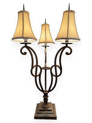 Three-Light Wrought Iron Table Lamp with Fabric Shades. A traditional three-light table lamp 
