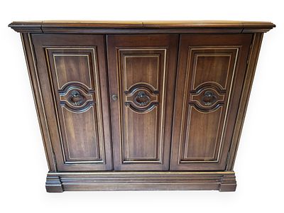 A Traditional Style Dark Stained Wood Bar Cabinet or Credenza with Pinstriping, 20th Century. Thi 